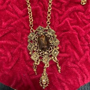 Gold Ornate Necklace with Brown Gem